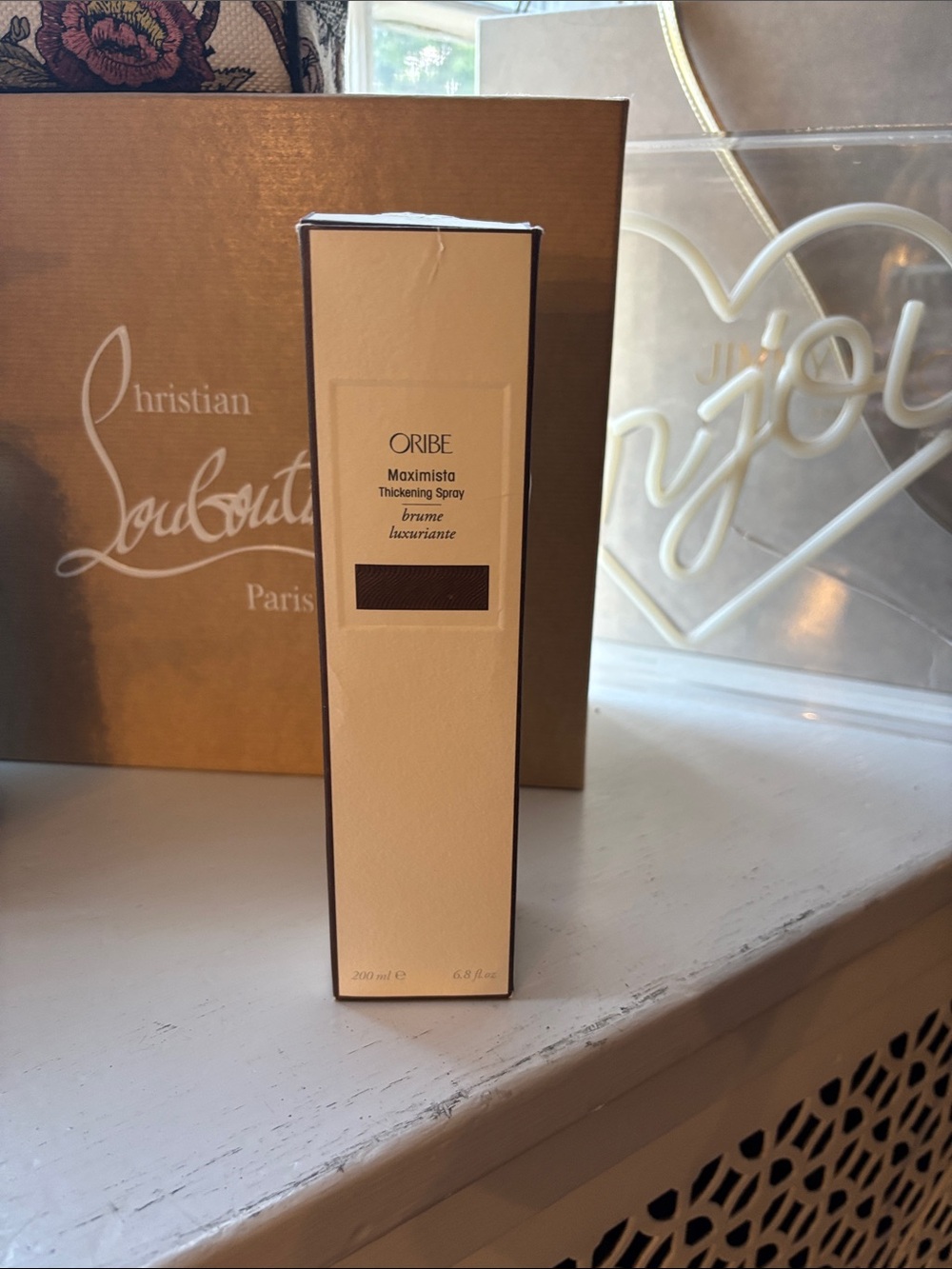 Oribe Maximista Thickening Spray — Cream and Brown Accents